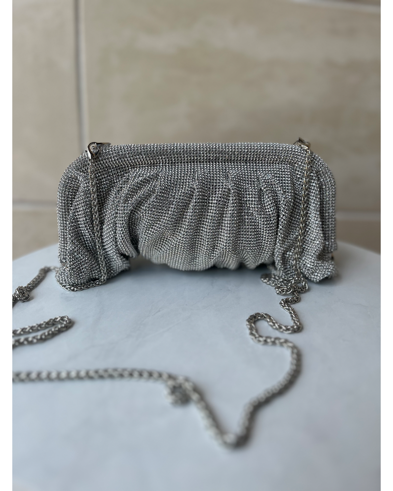 THE LIZA BAGGY SHIMMER CLUTCH